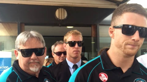 Matthew Blackford (centre) leaving court after receiving a guilty verdict for GBH against another player 19 February 2015