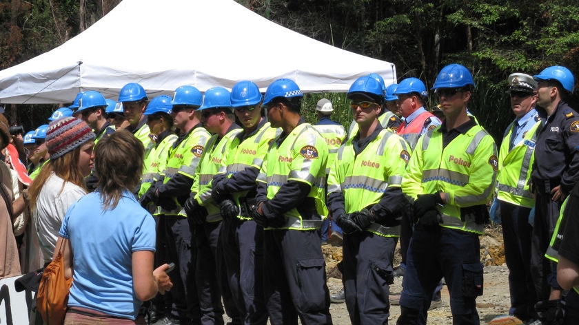 Police stand in a line to block protesters at the Florentine Valley in Tasmania, May 2009.