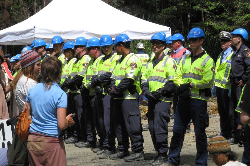 Police stand in a line to block protesters at the Florentine Valley in Tasmania, May 2009.