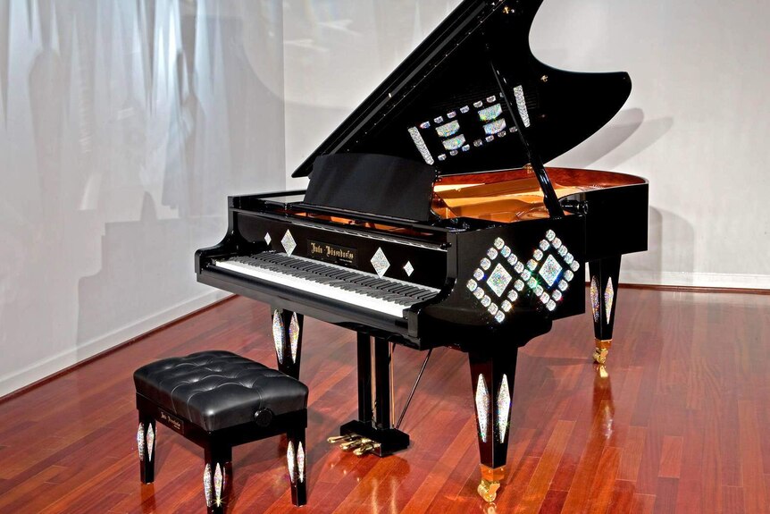 A crystal-studded Kuhn-Bosendorfer piano.