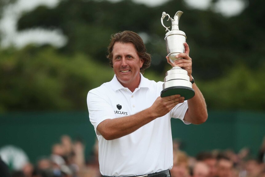 Mickelson shows off the spoils of victory