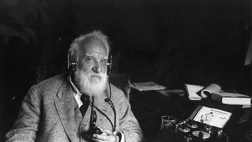 Alexander Graham Bell with one of his inventions