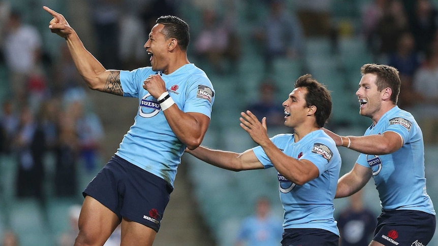 Try time ... Israel Folau celebrates scoring his five-pointer