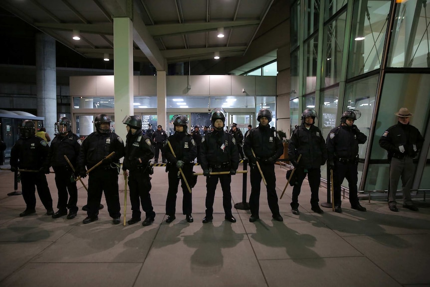 Police assemble outside JFK airport