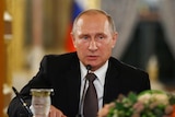 Russian President Vladimir Putin talks during a joint news conference with his Turkish counterpart.