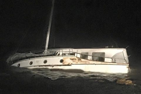 Recreational fishing boat washed aground in storm cell on New South Wales central coast
