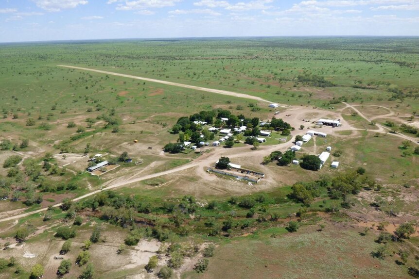 a cattle station homestead and green surrounds, taken from a helicopter