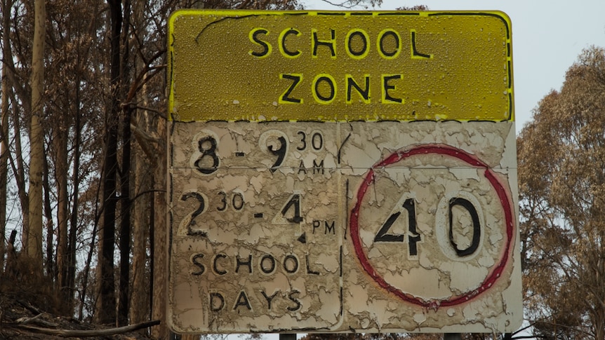 A burnt-out school zone sign at Mogo in the south-east of NSW