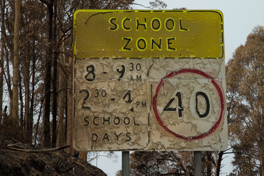 A burnt-out school zone sign at Mogo in the south-east of NSW