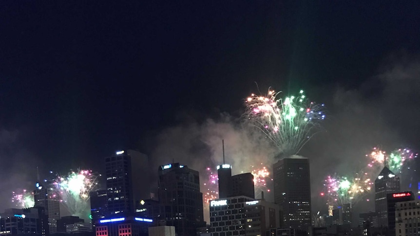Thousands gathered to watch the midnight fireworks display in the Melbourne CBD.