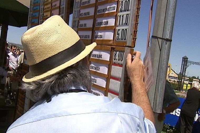 Bookmaker at a race meeting in Adelaide (ABC News)