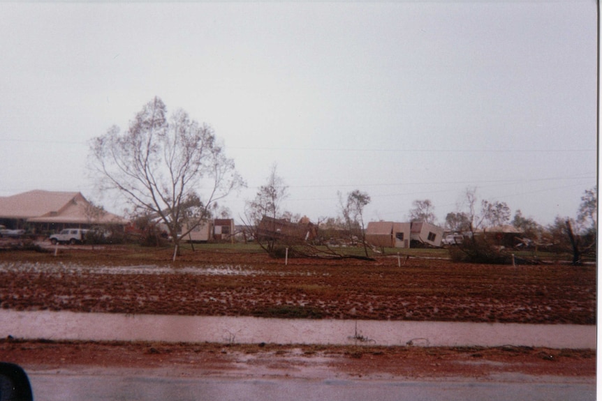 A number of houses either damaged or overturned after strong cyclonic winds.