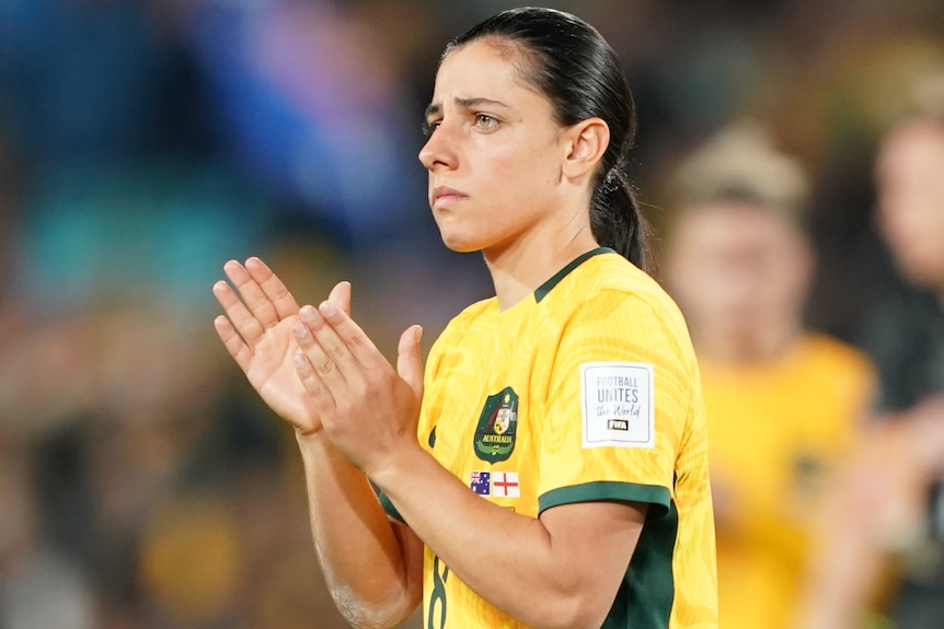 Alex Chidiac claps her hands after the Matildas played England in the FIFA Women's World Cup semifinal.