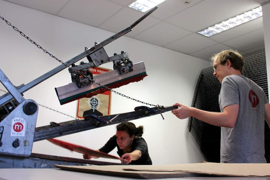 Miriam Slater and press studio manager John Hart at the Megalo Print Studio and Gallery, Canberra, November 2015.