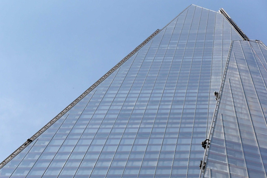 Six female protesters from Greenpeace scale The Shard in London.