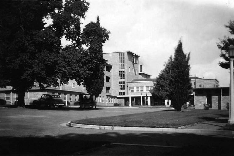 Black and white image of the hospital's exterior.