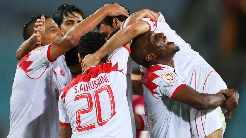 Bahrain celebrates goal against Qatar