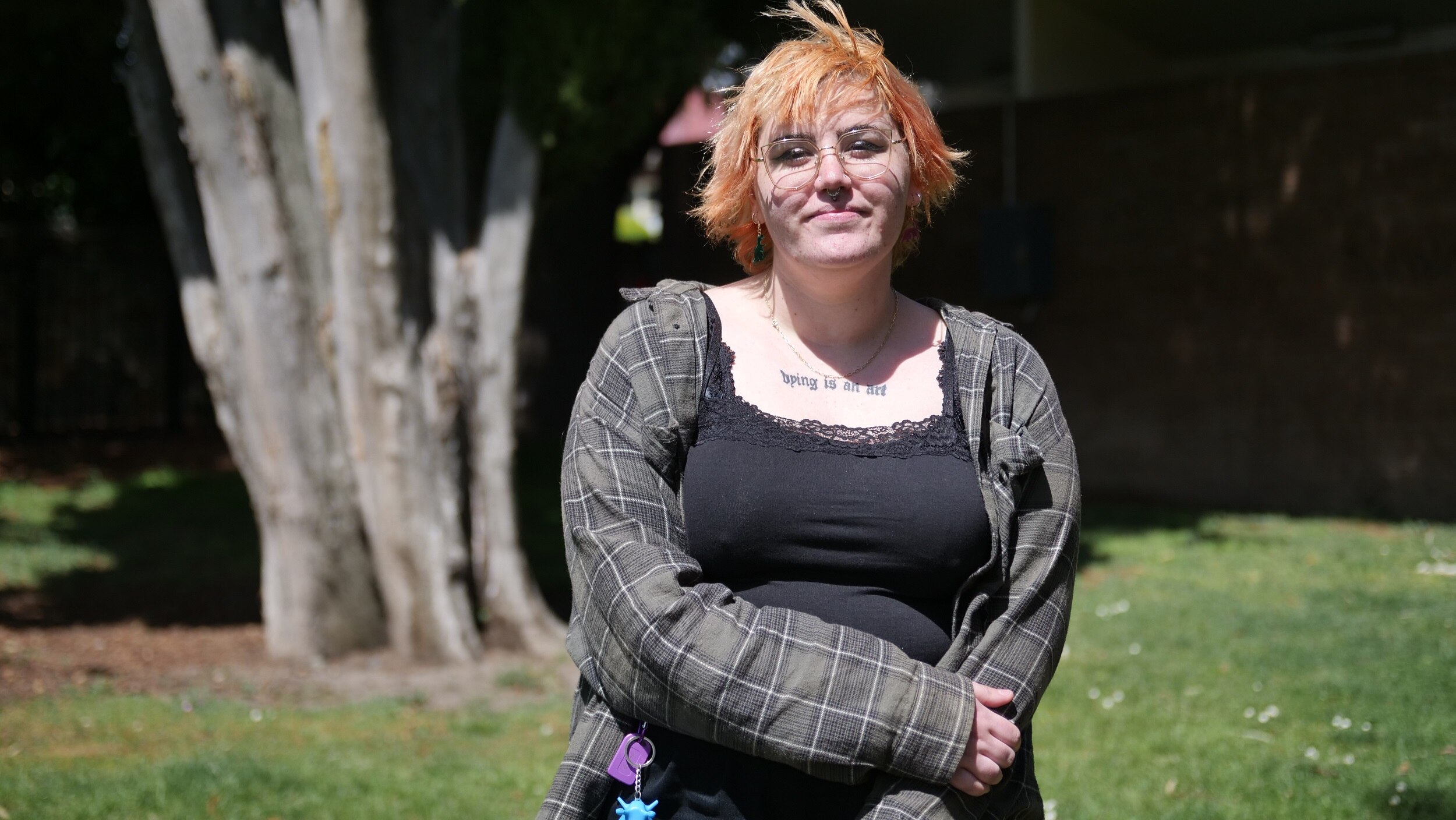 Susannah Mannie stands in outdoor setting.