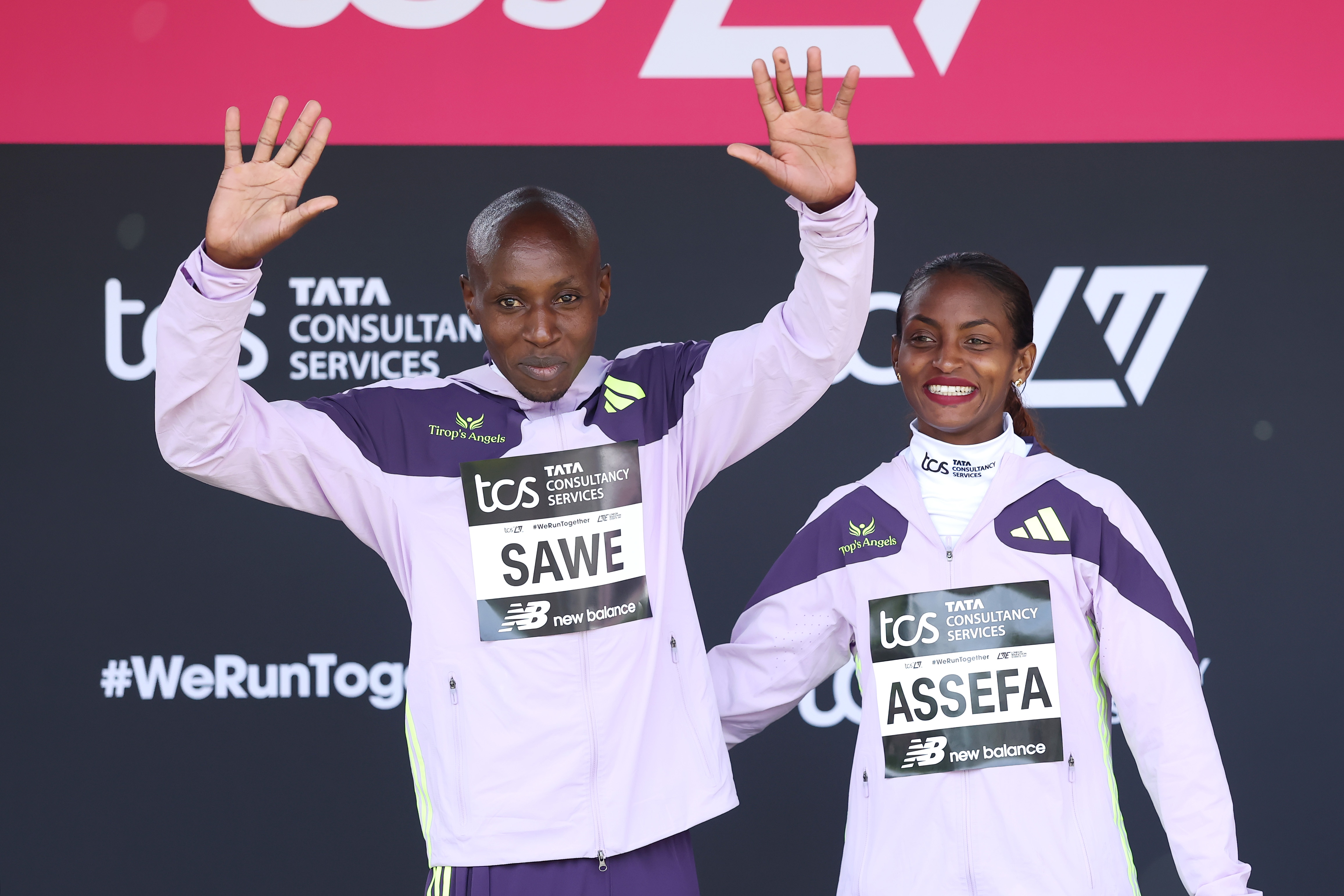 Sabastian Sawe e Tigst Assefa sorriem