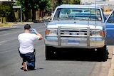 Police inspect vehicles after drug raids in Mildura