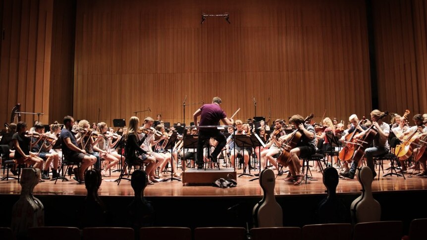 A photograph of the Australian Youth Orchestra Music Camp in rehearsal