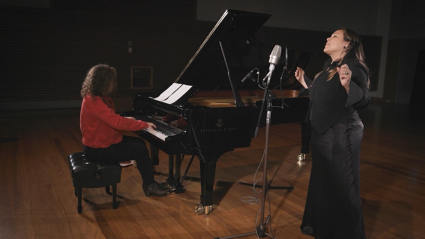 Tamara-Anna Cislowska at the piano while Kate Ceberano sings Earth and Sky in Eugene Goosens Hall.