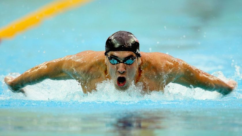 Michael Phelps wins the men's 200m butterfly gold medal