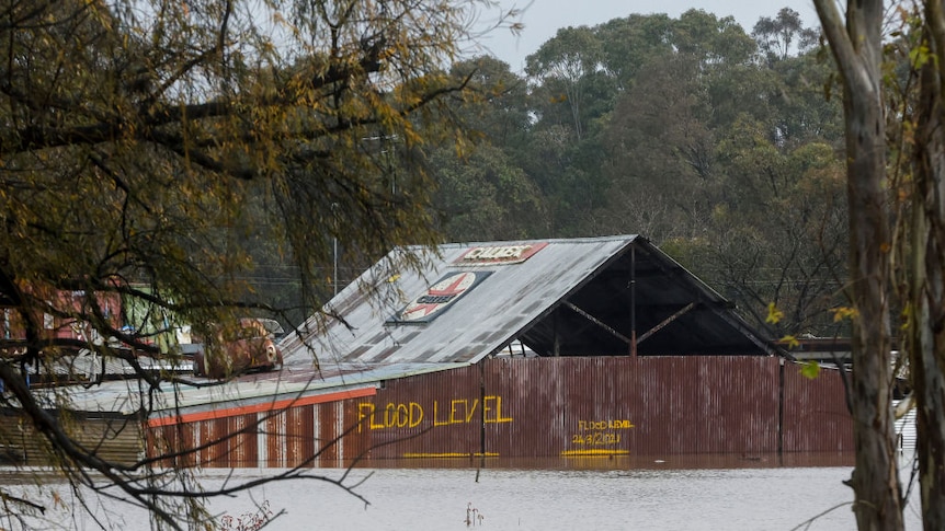 Buildings are seen inundated by floodwaters along the Hawkesbury River in the suburb of Windsor