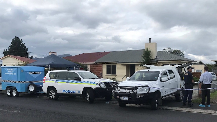 Police cars outside house