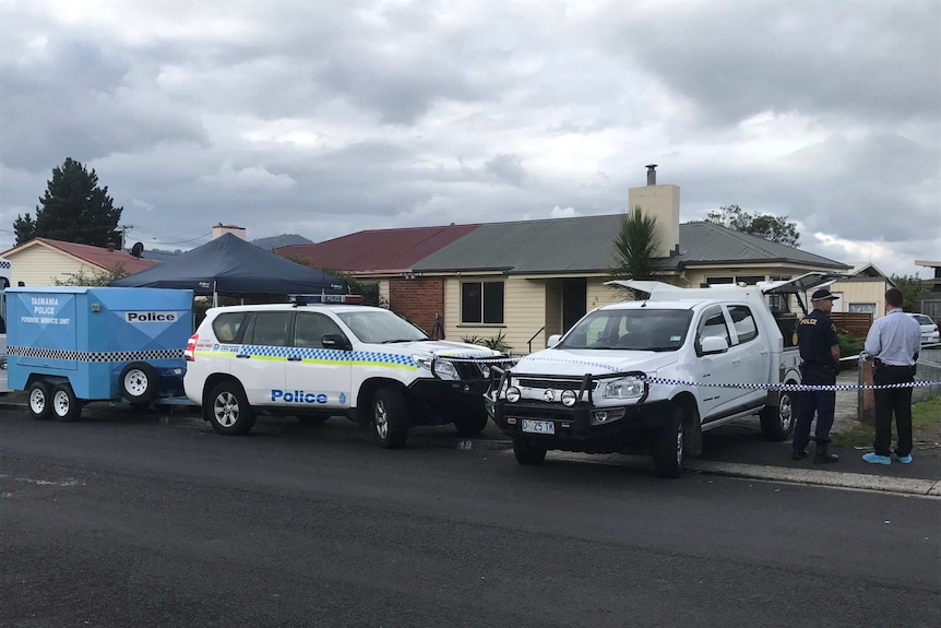 Police cars outside house