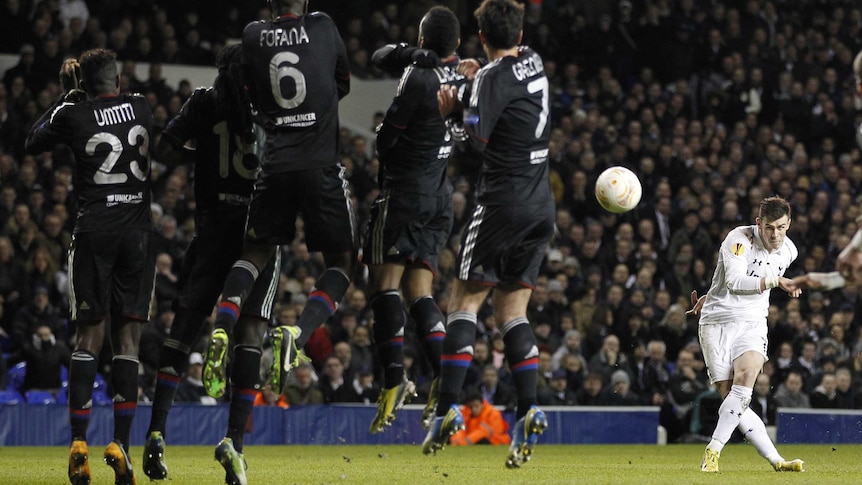 Spurs midfielder Gareth Bale scores his second goal in the Europa League match with Lyon.
