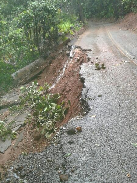 Road damaged by a landslip.