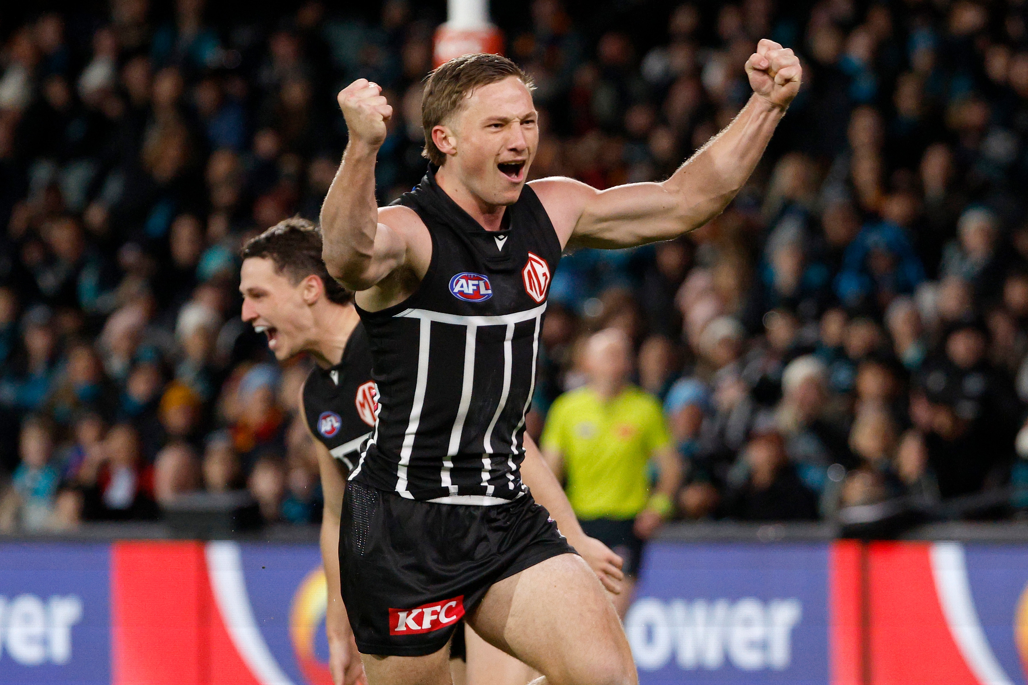 Mitch Zadow celebrates a Power AFL goal.