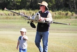 Man and boy with model aircraft