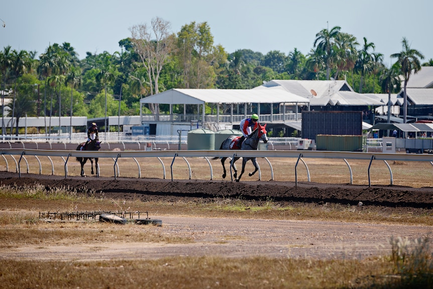 Jockeys train at the Darwin Turf Club Fannie Bay Racecourse in the Northern Territory. 