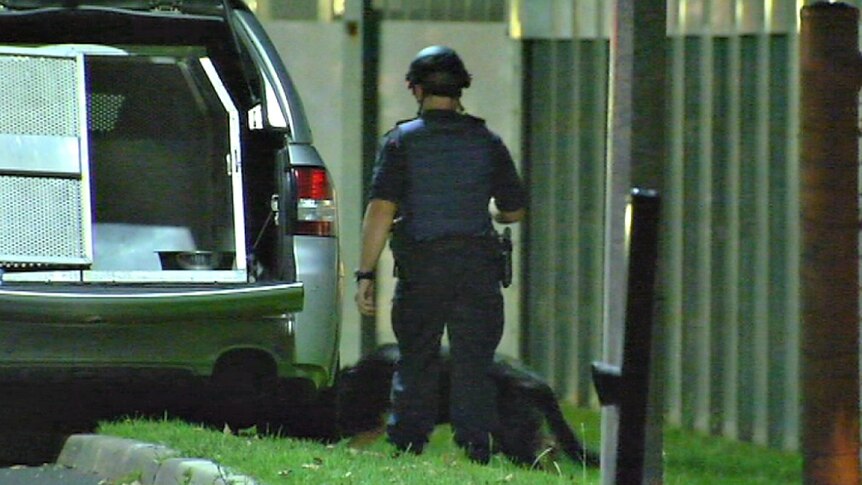 Police dog handler at Parkville Youth Justice Centre