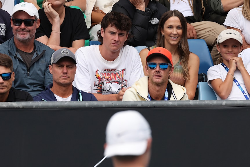 Lleyton Hewitt watches his son play at the Australian Open