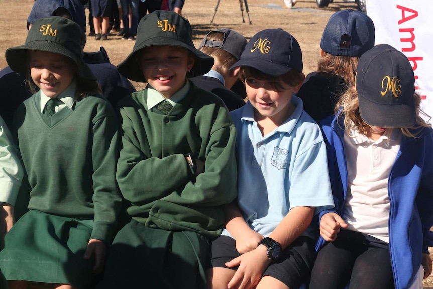 Young children wearing hats.