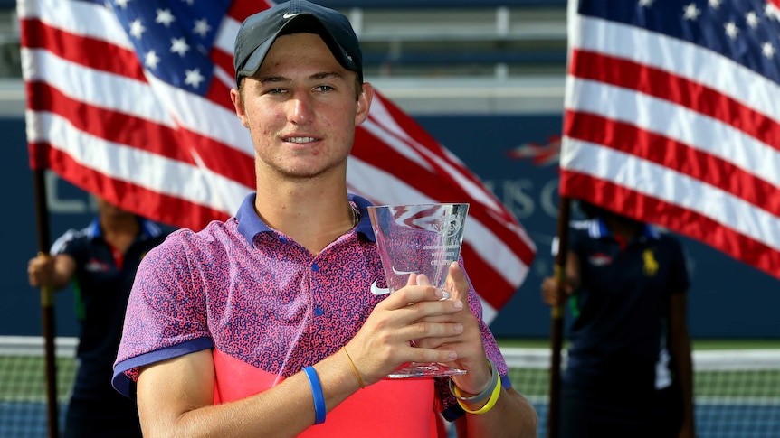 Jasika shows off US Open junior singles cup