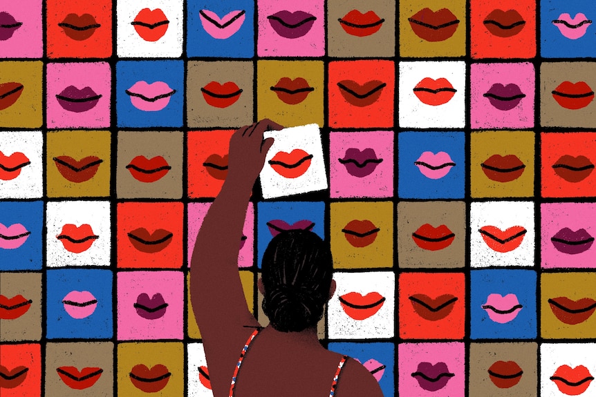 The back of a woman reaching up to choose a set of lips, of which there are many on display as if at a supermarket..