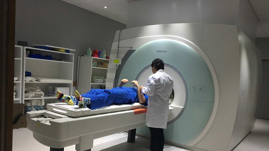 An athlete has an MRI at the Queensland Brain Institute