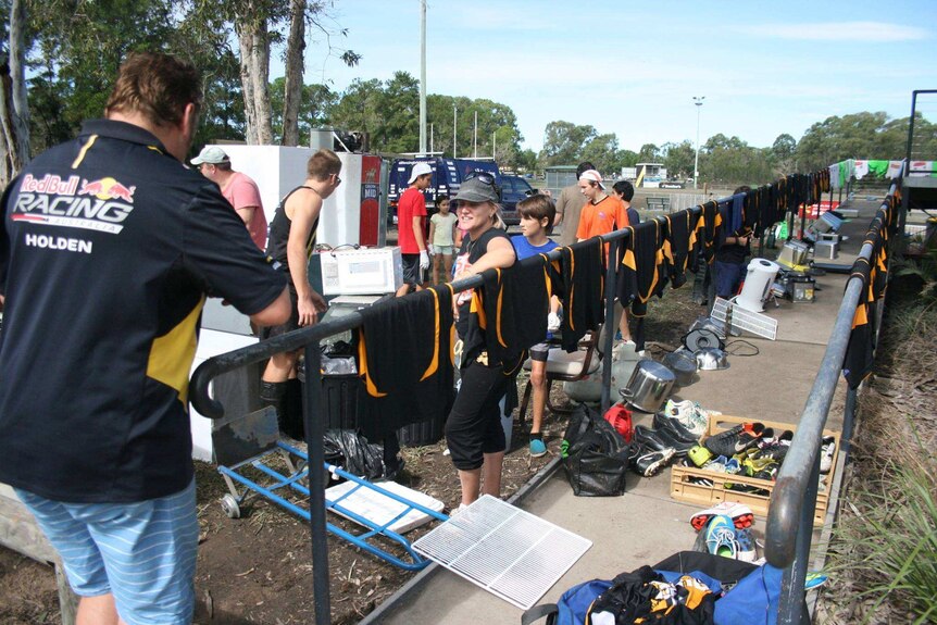 Volunteers clean up AFL club