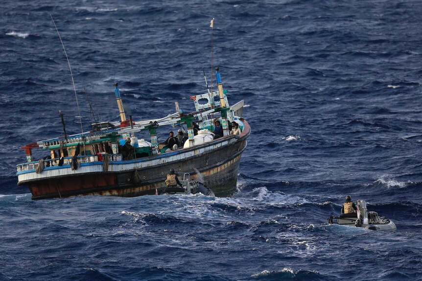 HMAS Newcastle seizes $520 million of heroin from boat off east African ...
