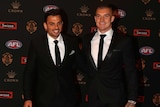 Sam Lloyd and Dustin Martin in tuxedos on the Brownlow Medal red carpet.