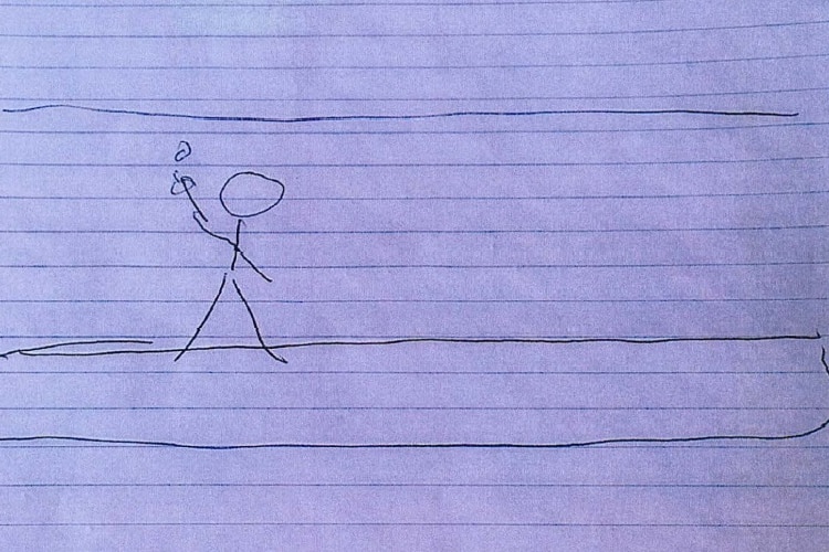 A stick figure drawing of a person cuffed to a wall