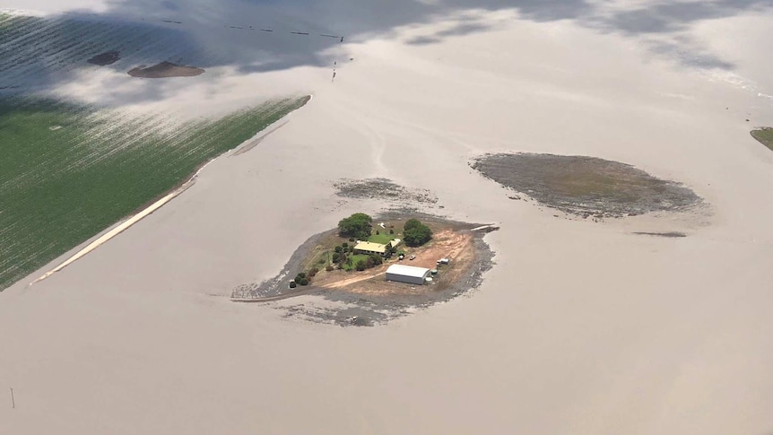 Aerial photo of property surrounded by floodwaters near Dalby.
