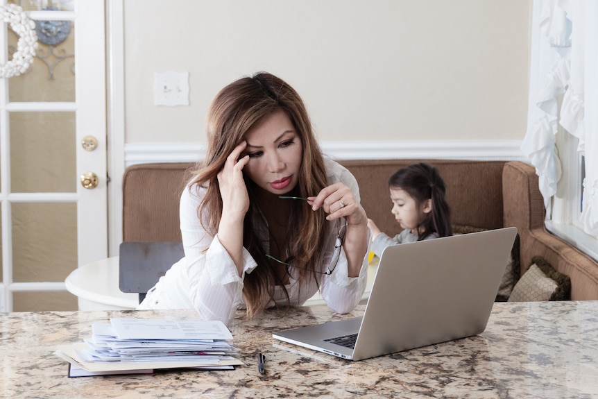 Mum working from home with child