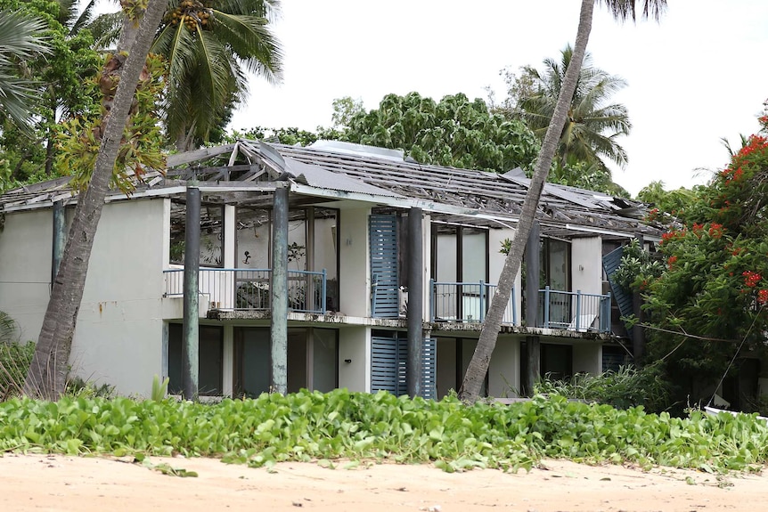 a wrecked block of beachside units