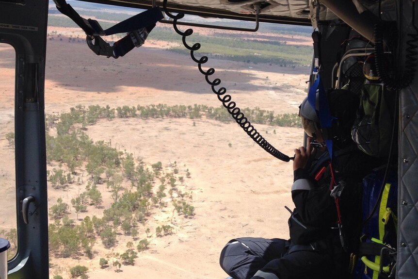 RACQ CQ Rescue helicopter searches for a missing man