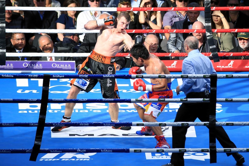 Jeff Horn takes a swing at Manny Pacquiao